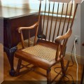 F11. Rocking chair with caned seat. 
